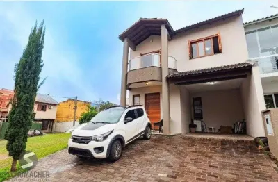Casa em condomínio fechado com 3 quartos à venda na Rua Deputado Hugo Mardini, 1842, Passo das Pedras, Porto Alegre