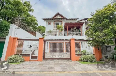 Casa com 4 quartos à venda na Avenida General Barreto Viana, 680, Chácara das Pedras, Porto Alegre