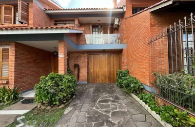 Casa com 4 quartos à venda na Rua Adão Pinheiro da Silva, 140, Ipanema, Porto Alegre