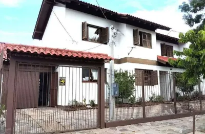 Casa com 3 quartos à venda na Rua Ari Peixoto Martins, 142, Espírito Santo, Porto Alegre