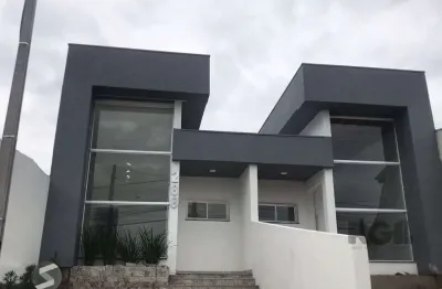 Casa com 3 quartos à venda na Rua Araranguá, 370, COHAB A, Gravataí