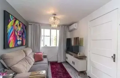 Casa em condomínio fechado com 2 quartos à venda na Rua Tenente Ary Tarrago, 1780, Jardim Itu Sabará, Porto Alegre
