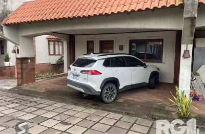 Casa em condomínio fechado com 3 quartos à venda na Rua Gilberto Laste, 200, Santa Tereza, Porto Alegre