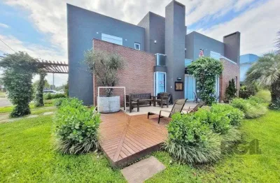 Excelente sobrado de esquina, com vista para o lago, próximo ao clube social, no condomínio acqualina beach, localizado na praia de maristela , em xangri-la,. possui 4 dormitórios, sendo 3 suítes,