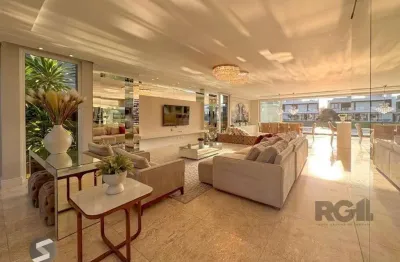 Excepcional sobrado 5 dormitórios com 5 suítes, totalmente mobiliado e ricamente decorado a beira lago em xangrilá, no condomínio enseada.