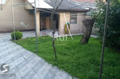 Casa com 3 quartos à venda na Rua Toroquá, 465, Passo da Areia, Porto Alegre