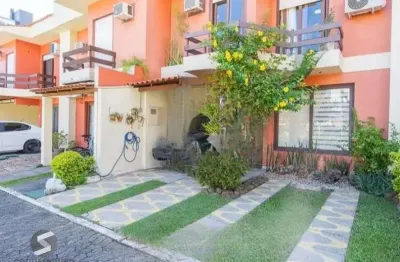 Linda casa com 3 dormitórios, sendo 1 suíte, sala ampla no condomínio de ótima localização