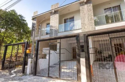 Casa com 3 quartos à venda na Rua Abdo Jorge Curi, 319, Parque Santa Fé, Porto Alegre