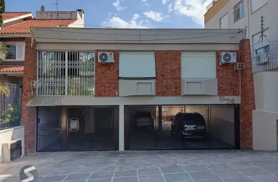 Apartamento térreo com 3 dormitórios e 2 vagas no bairro cristo redentor