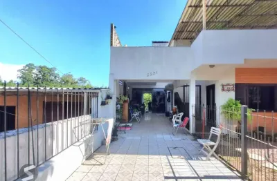 Casa com 5 quartos à venda na Avenida Vicente Monteggia, 2281, Cavalhada, Porto Alegre