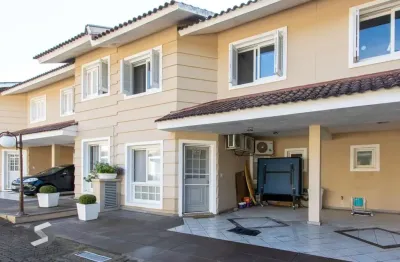 Casa em condomínio, com 3 quartos, com suíte, 2 vagas cobertas, churrasqueira, no bairro nonoai.