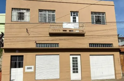 Casa com local comercial e apartamento - centro- santana do livramento-rs