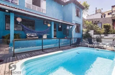 Casa com 4 quartos à venda na Rua Eleutério Araújo, 187, Partenon, Porto Alegre