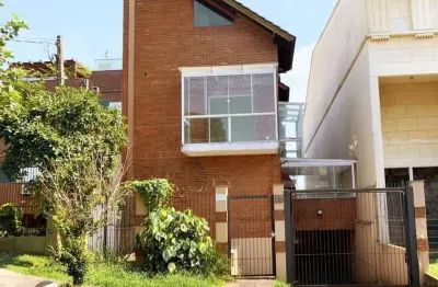 Casa em condomínio fechado com 3 quartos à venda na Rua São Leopoldo, 146, Vila Jardim, Porto Alegre