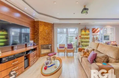 Casa em condomínio fechado com 4 quartos à venda na Rua Attílio Bilibio, 190, Jardim Carvalho, Porto Alegre