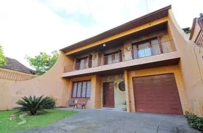 Casa com 3 quartos à venda na Avenida João Wallig, 192, Passo da Areia, Porto Alegre