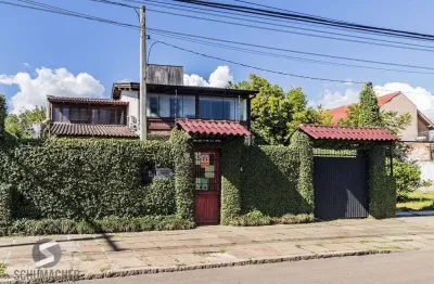 Casa com 3 quartos à venda na Avenida Guarujá, 237, Guarujá, Porto Alegre
