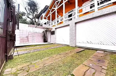 Casa com 3 quartos à venda na Rua Cachoeira, 113, Nonoai, Porto Alegre