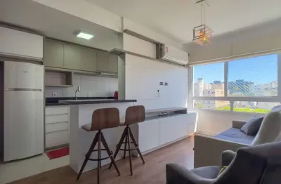 Excelente apartamento 2 dormitorios semi mobiliado localizado na cidade baixa