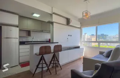 Excelente apartamento 2 dormitorios semi mobiliado localizado na cidade baixa