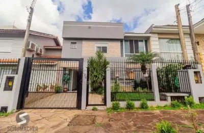 Casa em condomínio fechado com 3 quartos à venda na Rua Ronaldo Molina de Quadros, 412, Mário Quintana, Porto Alegre