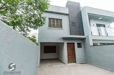 Casa com 3 quartos à venda na Rua Ronaldo Molina de Quadros, 477, Mário Quintana, Porto Alegre