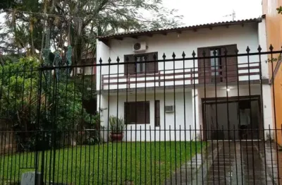Casa com 5 quartos à venda na Rua Doutor Mário Totta, 1614, Tristeza, Porto Alegre