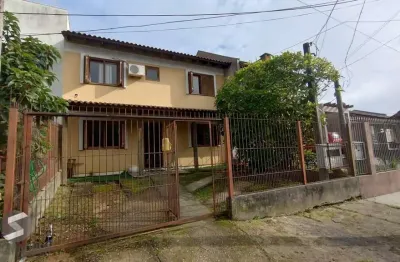 Casa com 4 quartos à venda na Rua Doutor Cláudio Walter Ferreira da Silva, 269, Guarujá, Porto Alegre