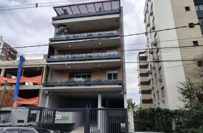 Apartamento garden de 2 dormitórios, 1 suíte e 2 vagas de garagem.