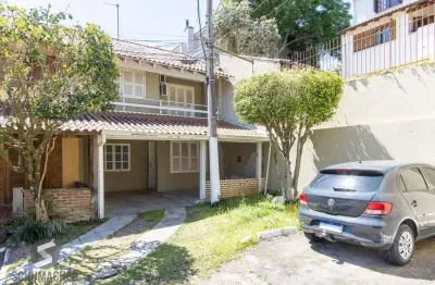 Casa em condomínio fechado com 3 quartos à venda na Avenida Juca Batista, 1585, Cavalhada, Porto Alegre