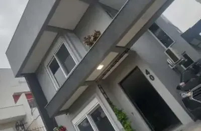 Casa com 3 quartos à venda na Rua Doutor Sérgio de Figueiredo, 105, Guarujá, Porto Alegre
