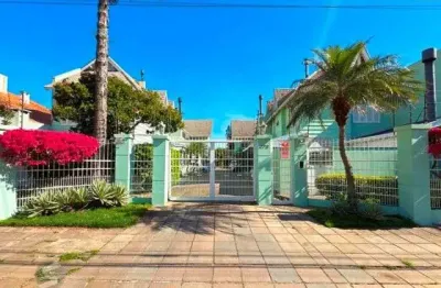 Casa em condomínio fechado com 4 quartos à venda na Rua Jacipuia, 346, Guarujá, Porto Alegre