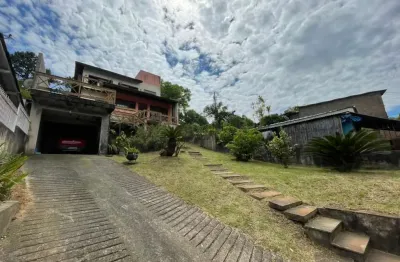 Casa à venda em belém novo – vista deslumbrante para o guaíba!