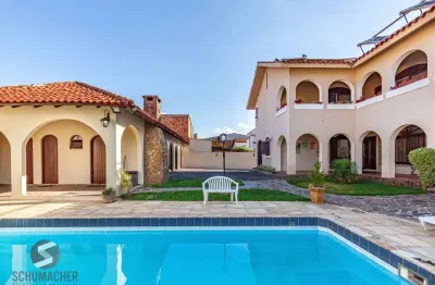 Casa com 6 quartos à venda na Rua Paulo Blaschke, 735, Jardim Planalto, Porto Alegre