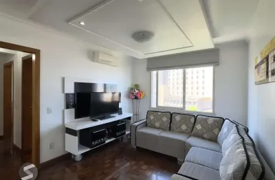 Apartamento mobiliado de 71m², com 2 dormitórios, sendo 1 suíte e vaga no centro