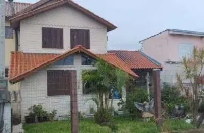 Casa com 3 quartos à venda na Rua dos Guenoas, 144, Guarujá, Porto Alegre