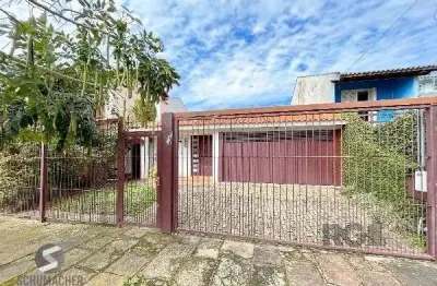 Casa em porto alegre, no bairro guarujá, com 3 dormitório(s), à venda.