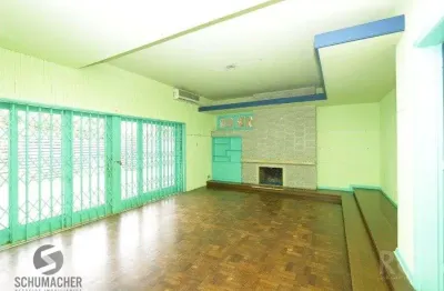 Casa com 5 quartos à venda na Rua Coronel Paulino Teixeira, 471, Rio Branco, Porto Alegre