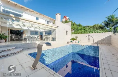 Casa com 5 dormitórios, suíte master e piscina no jardim planalto