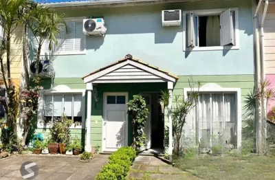 Casa em condomínio no bairro Sarandi de 2 dormitórios, vaga e infra