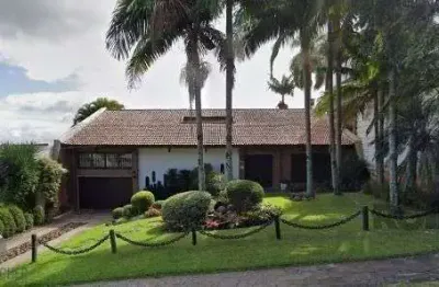 Casa em Porto Alegre, no bairro Vila Assunção, com 3 dormitório(s), à venda.