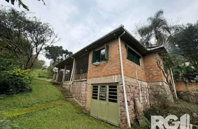 Casa com 3 quartos à venda na Rua dos Canudos, 358, Cascata, Porto Alegre