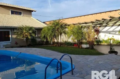 Casa com 3 quartos à venda na Rua Brinco-de-Princesa, 269, Restinga, Porto Alegre