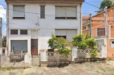 Casa com 3 quartos à venda na Rua Umbú, 389, Passo da Areia, Porto Alegre