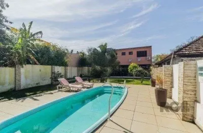 Casa com 3 quartos à venda na Rua Humberto de Campos, 1267, Partenon, Porto Alegre