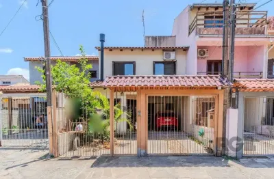 Casa com 3 quartos à venda na Rua Edgar Sanches Laurent, 77, Hípica, Porto Alegre
