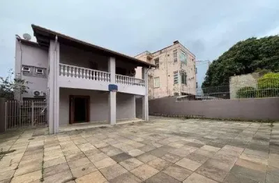 Casa com 4 quartos à venda na Rua Fonseca Ramos, 127, Medianeira, Porto Alegre