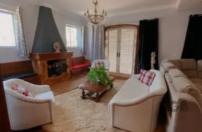Casa com 4 quartos à venda na Rua Fernando Osório, 275, Teresópolis, Porto Alegre