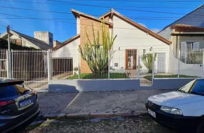 Casa com 6 quartos à venda na Rua Paissandu, 298, Partenon, Porto Alegre