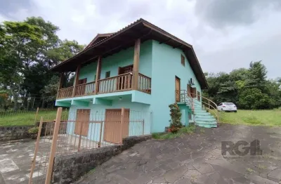 Casa com 3 quartos à venda na Avenida Santo Dias da Silva, 924, Lomba do Pinheiro, Porto Alegre